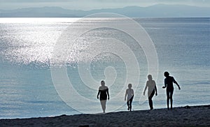 Silhouette of four ladies during Sunset