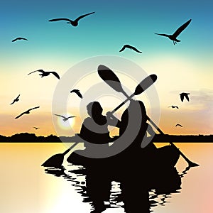 Silhouette of funny girls kayaking.