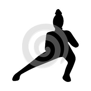 Silhouette of a girl doing sports. A woman in a pose crouches. Yoga, exercise, fitness, stretching. Silhouettes on an isolated