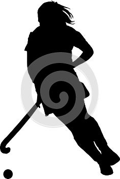 Silhouette of girl hockey player dribbling ball