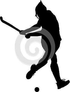 Silhouette of girl hockey player hitting ball