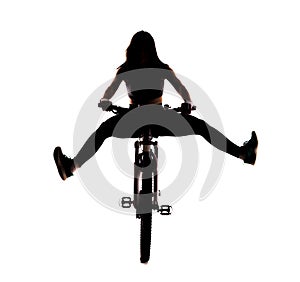 Silhouette girl on a mountainbike