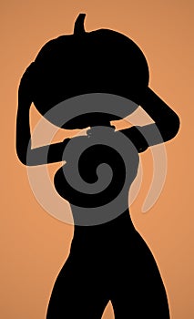 silhouette of a girl with a pumpkin on her head on an orange background 3d-rendering