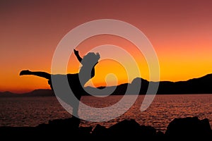 Silhouette of a girl by the sea