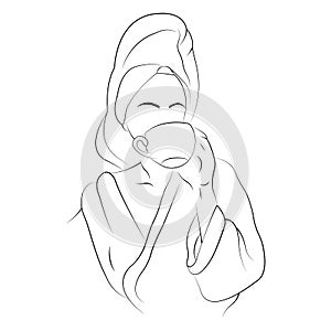 Silhouette of a girl in a towel on her head and a dressing gown drinks coffee. Minimalism style. Home cosiness and comfort concept