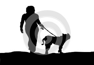 Silhouette girl walks with the dog