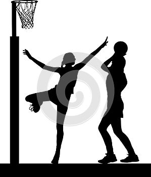 Silhouette of girls netball players jumping and blocking