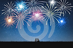 Silhouette of girls selfie on mountain and night sky with fireworks