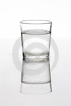 Silhouette of a glass of cold water photo