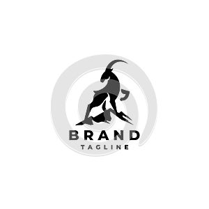 Silhouette of a Goat Standing on the Top of a Mountain Logo Design