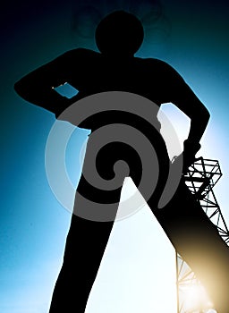 Silhouette of The Golden Driller - Historic Tulsa Landmark - Mid Continent Oil photo