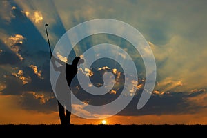 Silhouette golfer playing golf