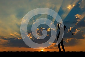 Silhouette golfer playing golf