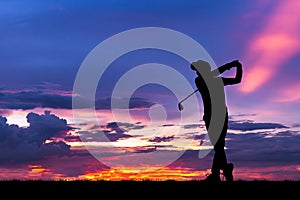 Silhouette golfer playing golf