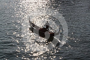 Silhouette of gondola in sunset