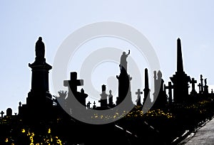 Silhouette of graveyard, the image shows many tombstone.