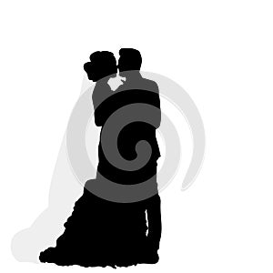 Silhouette of the groom hugging the bride, wedding