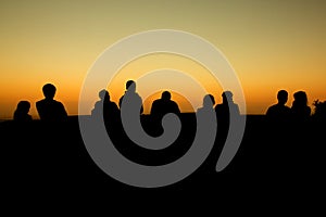 silhouette of group of friends standing