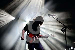 Silhouette of the guitarist of The War on Drugs (band), in concert at Vida Festival