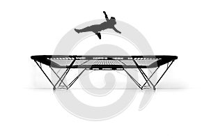 Silhouette of gymnast on trampoline