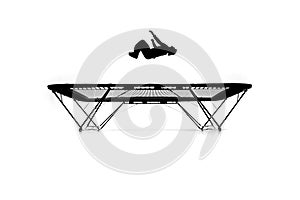 Silhouette of gymnast on trampoline