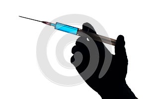 Silhouette of a hand with syringe filled with blue liquid, isolated on white background. Vaccination concept.