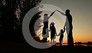 Silhouette of a happy family