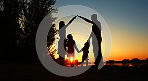 Silhouette of a happy family