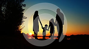 Silhouette of a happy family