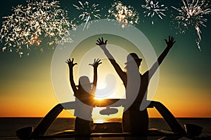 Silhouette of happy family at the beach