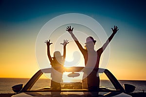 Silhouette of happy family at the beach