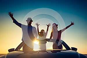 Silhouette of happy family at the beach