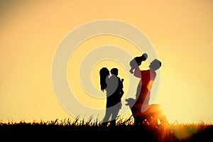 Silhouette of Happy Family and Dog