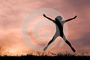 Silhouette of happy women playing