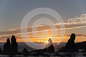 Silhouette of Hashigui-iwa Rocks at dawn photo