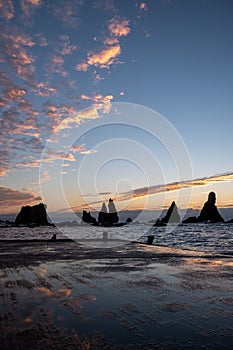 Silhouette of Hashigui-iwa Rocks at dawn photo
