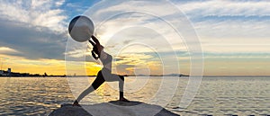 Silhouette healthy woman yoga ball balance body exercising vital meditate and practicing