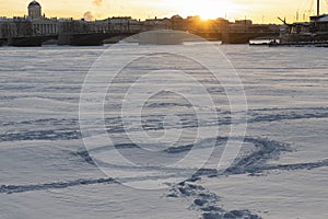 Silhouette of a heart in the snow with sunset Saint Petersburg, Russia