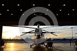 Silhouette of helicopter in the hangar