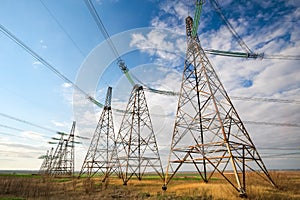 Silhouette High voltage electric towers. High-voltage power lines. Electricity distribution station