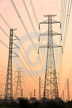 Silhouette high voltage pole on sky sunset background
