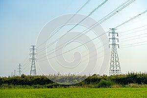 Silhouette high voltage pole on sky sunset background