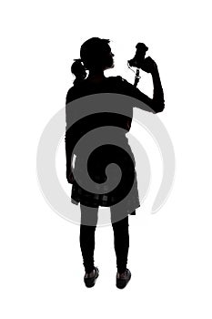 Silhouette of a Hiking Photographer on a White Background