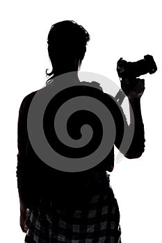 Silhouette of a Hiking Photographer on a White Background