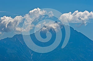 Silhouette of the holy mountains Athos and a small cloud above the mountain top, Chalkidiki