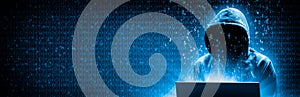 Silhouette Of Hooded Criminal Hacking Computer On Binary Code Background