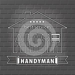 Silhouette of a house with tools for repair. Handyman logo on brick wall background in grey.