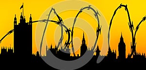 Silhouette of Houses of Parliament, Westminster, London superimposed with barbed wire