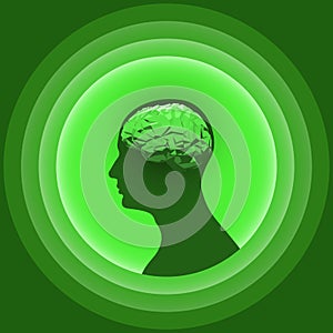 Silhouette of the human head with glowing brain. Design element for graphic media of medicinal products.