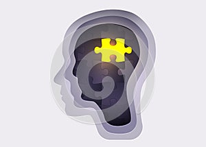 Silhouette of a human head with jigsaw puzzle. Concept of mental health and psychology